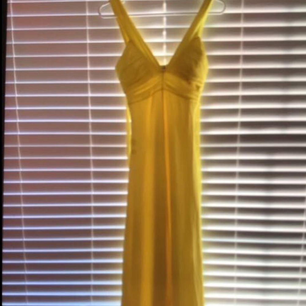Yellow formal dress with light layers